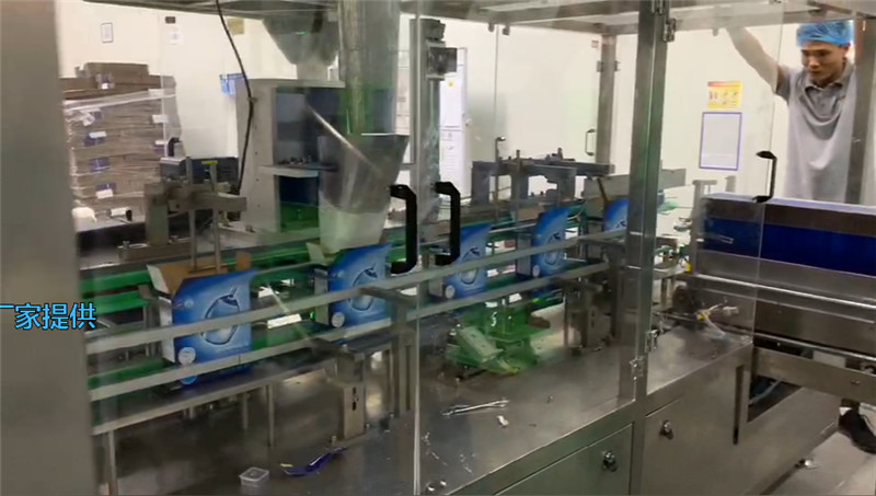 Vertical packing machine for washing tablets